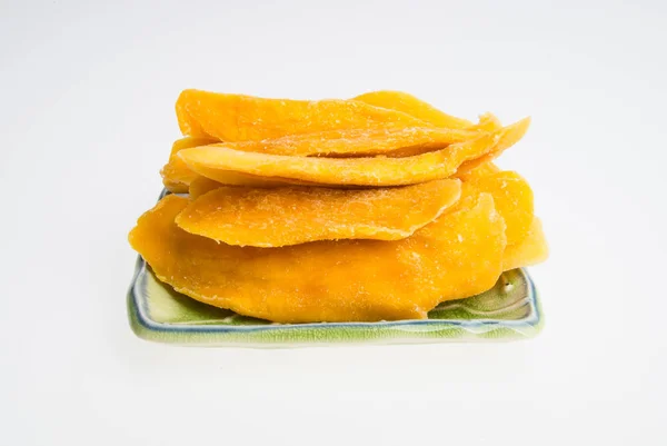 Dried Mango or Dried Mango slices on a background. — Stock Photo, Image