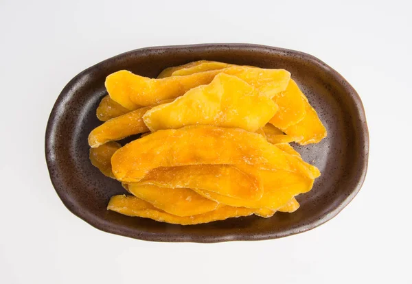 Dried Mango or Dried Mango slices on a background. — Stock Photo, Image