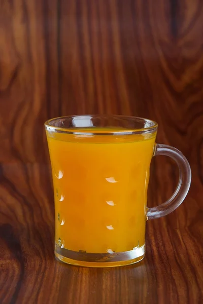 Apelsinjuice på en bakgrund — Stockfoto