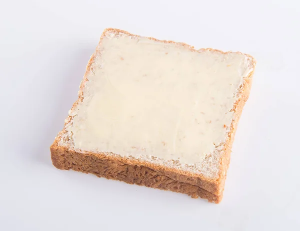 Bröd. bröd med smör på en bakgrund — Stockfoto