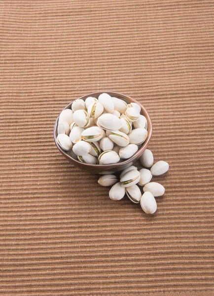 Nuts. pistachios on the background — Stock Photo, Image