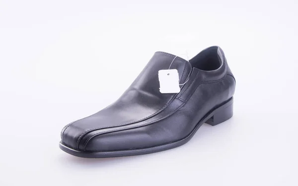 Schoen Herenschoenen Met Prijs Tag Een Achtergrond — Stockfoto