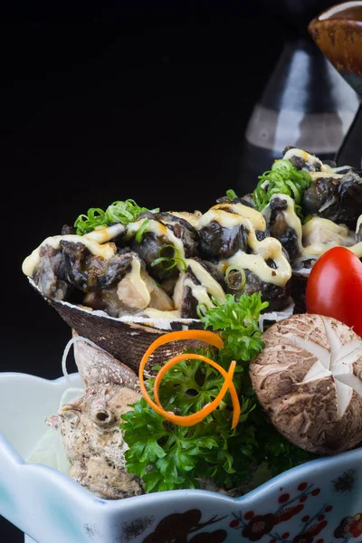 Japanese cuisine. grilled shell fish on the background — Stock Photo, Image