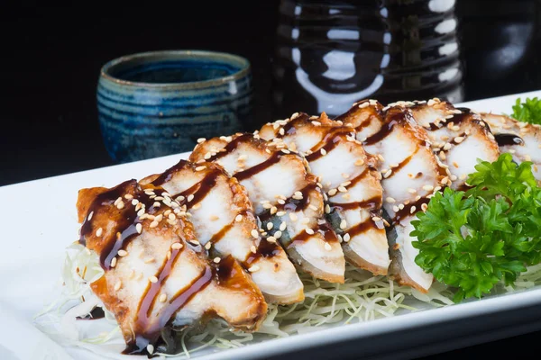 Japanese cuisine. unagi or eel on the background — Stock Photo, Image