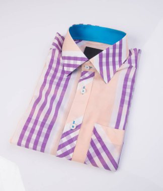 gömlek. arka plan üzerinde katlanmış erkek gömlek