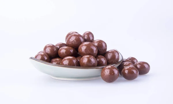 Chocolade ballen. chocolade ballen in kom op een achtergrond — Stockfoto