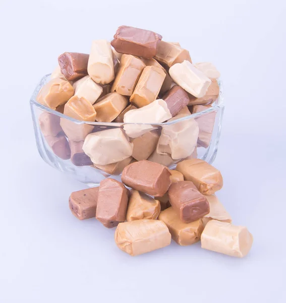 Süßigkeiten. Karamellbonbons. Karamellbonbons auf einem Hintergrund. Karamell — Stockfoto