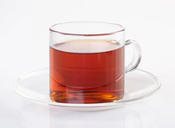 El té en la taza de cristal sobre el fondo. Té en taza de vidrio en un backgrou — Foto de Stock
