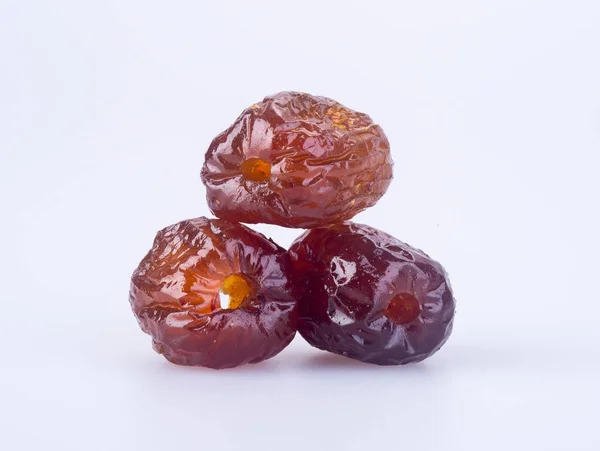 Preserved fruits. chinese sugar date preserved fruits on the bac Stock Photo