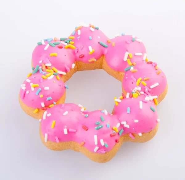 Donut, fresh delicious pink donut on a background.