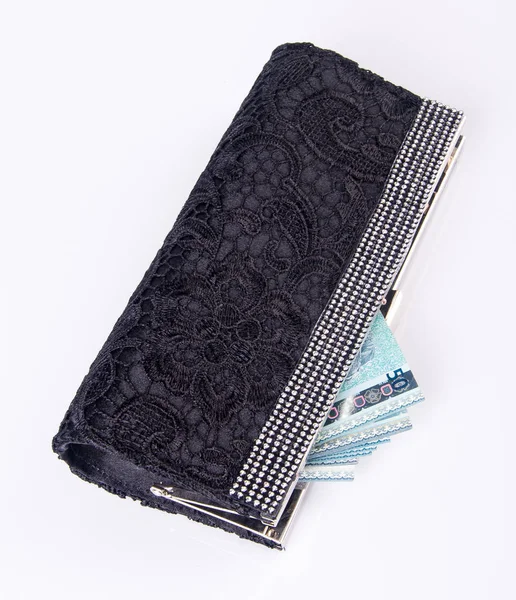 Portafoglio. portafoglio donna con soldi su uno sfondo — Foto Stock