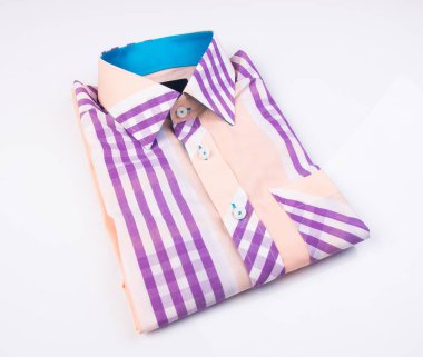 gömlek. bir arka plan üzerinde katlanmış erkek gömlek