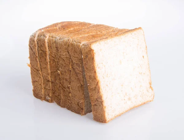 Brotscheibe auf einem Hintergrund — Stockfoto