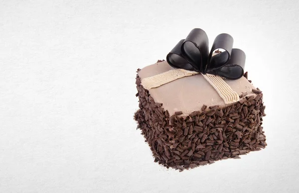 Gâteau ou gâteau au chocolat sur un fond . — Photo