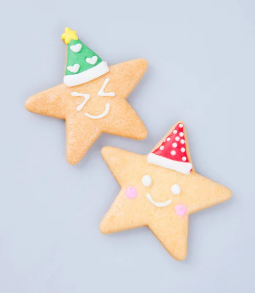 Kaka dekoration eller stjärna form jul cookies på bakgrund. — Stockfoto