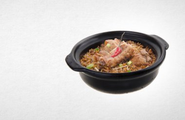 Claypot domuz eti pilav veya bir arka plan üzerinde domuz eti pilav.