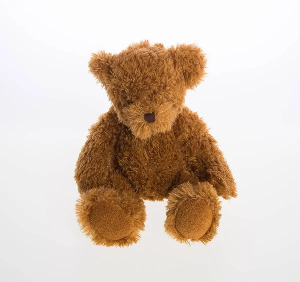 Іграшковий або іграшковий ведмідь на фоні . — стокове фото