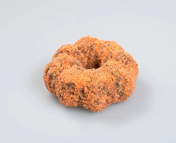 Donut ou donut fresco em um fundo . — Fotografia de Stock