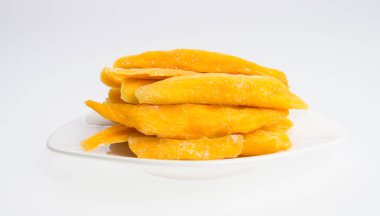 Bir arka plan üzerinde kurutulmuş Mango veya kurutulmuş Mango dilimleri.