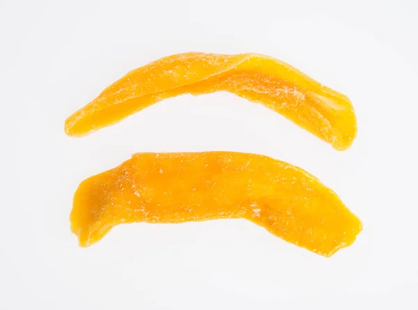 Mangue séchée ou tranches de mangue séchée sur un fond . — Photo