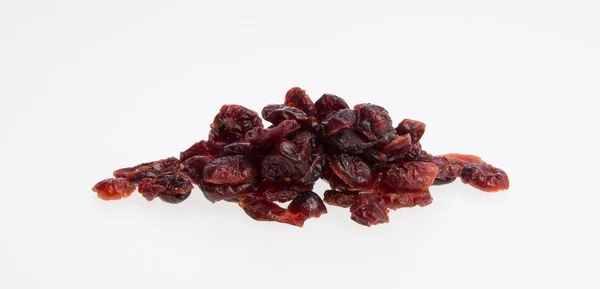 Dried cranberries or dried fruits on a background. — Stock Photo, Image