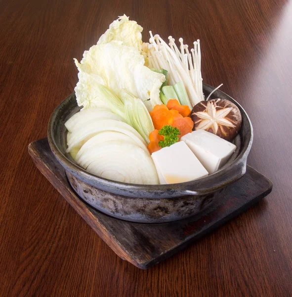 Cucina giapponese. pentola calda sullo sfondo — Foto Stock