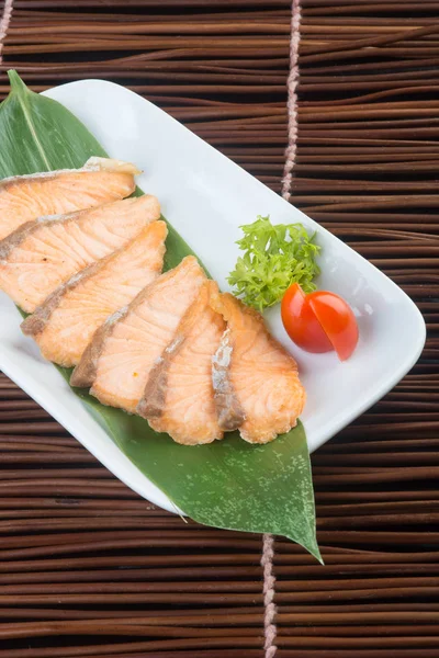 Japanese cuisine. fried fish on the background — Stock Photo, Image