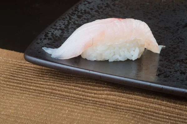 Cucina giapponese. sushi sullo sfondo — Foto Stock