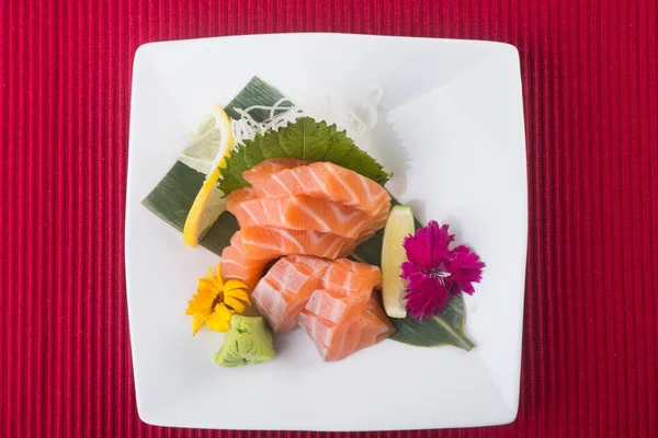 Japanse keuken. Sashimi op de achtergrond — Stockfoto