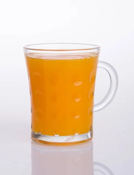 Suco de laranja em um contexto — Fotografia de Stock