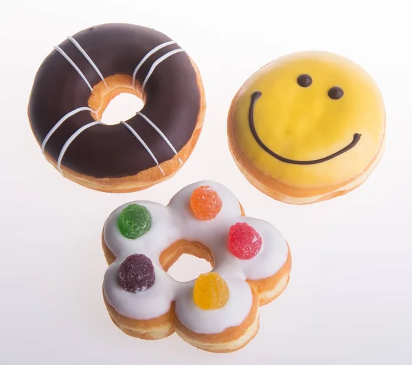 Assorted donuts donuts on a background — Stock Photo, Image