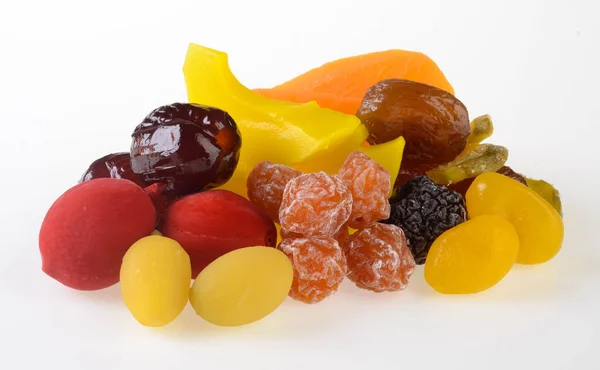 Сухофрукти або різноманітні консервовані фрукти на фоні . — стокове фото