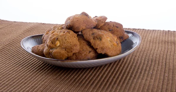Biscoitos de chocolate no fundo — Fotografia de Stock