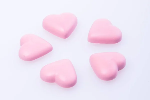 Cioccolato in colore rosa o cioccolato a forma di amore . — Foto Stock