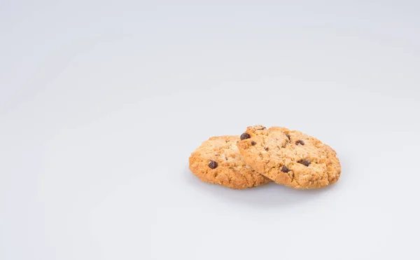Galletas o galletas de chocolate sobre un fondo . — Foto de Stock