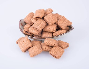 bir arka plan üzerinde krem çikolata çerez ya da bisküvi dolu.