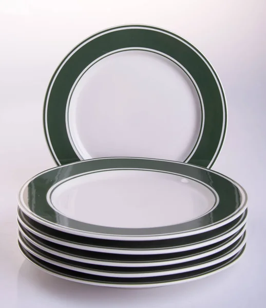 Plate or ceramic plate on a background. — Stock Photo, Image