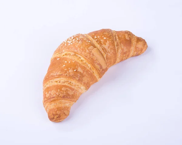 Croissant o gustoso croissant sullo sfondo . — Foto Stock