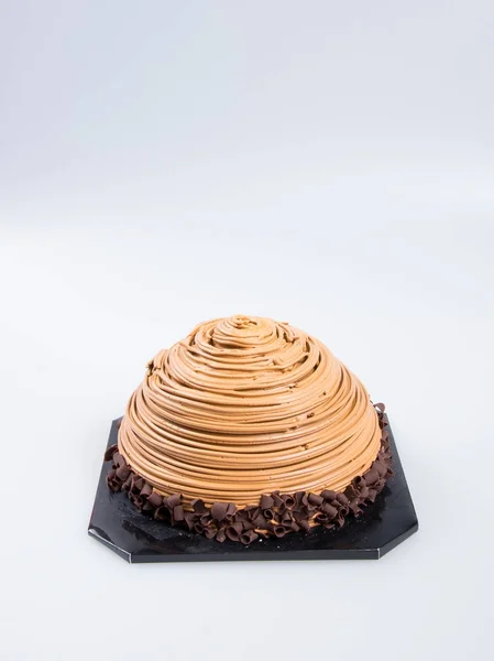 Gâteau ou gâteau au chocolat sur un fond . — Photo