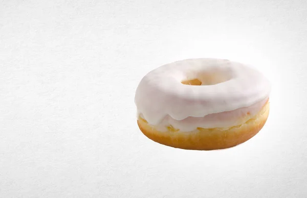 Donut eller färsk donut på en bakgrund. — Stockfoto