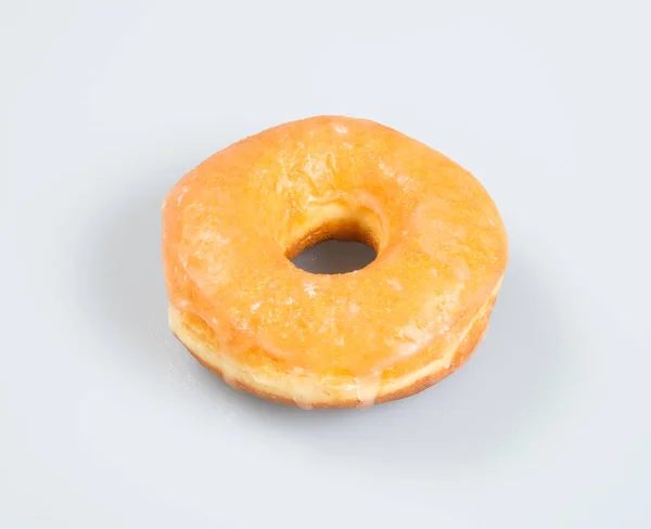 Donut ou donut clássico em um fundo . — Fotografia de Stock