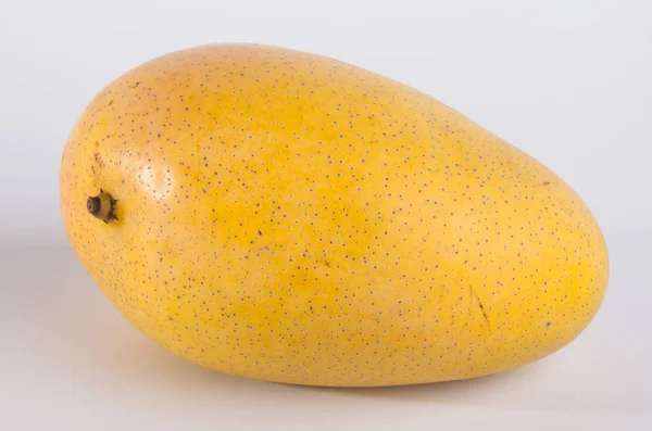 Манго. солодкий манго на фоні . — стокове фото
