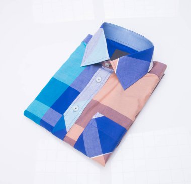 gömlek. bir arka plan üzerinde katlanmış erkek gömlek