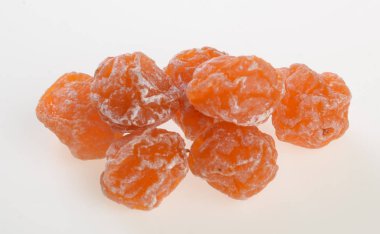 Kurutulmuş korunmuş Çin Erik veya bir arka plan üzerinde kurutulmuş meyve.