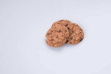 tanımlama bilgilerini veya bir arka plan üzerinde çikolata kurabiye.