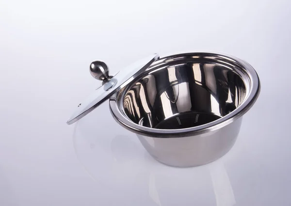 Pan eller rostfritt stål pan på bakgrund. — Stockfoto