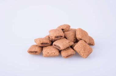 bir arka plan üzerinde krem çikolata çerez ya da bisküvi dolu.