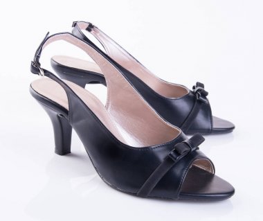 Ayakkabı veya bir arka plan üzerinde siyah renkli Bayan Ayakkabı.