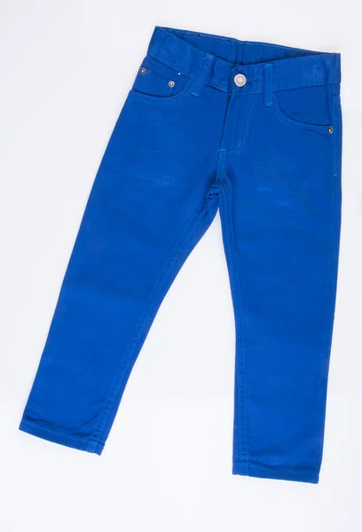 Jeans för barn eller blå färg jeans på en bakgrund. — Stockfoto