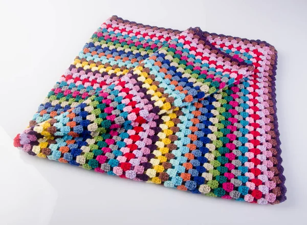 crochet or crochet blanket on a background.